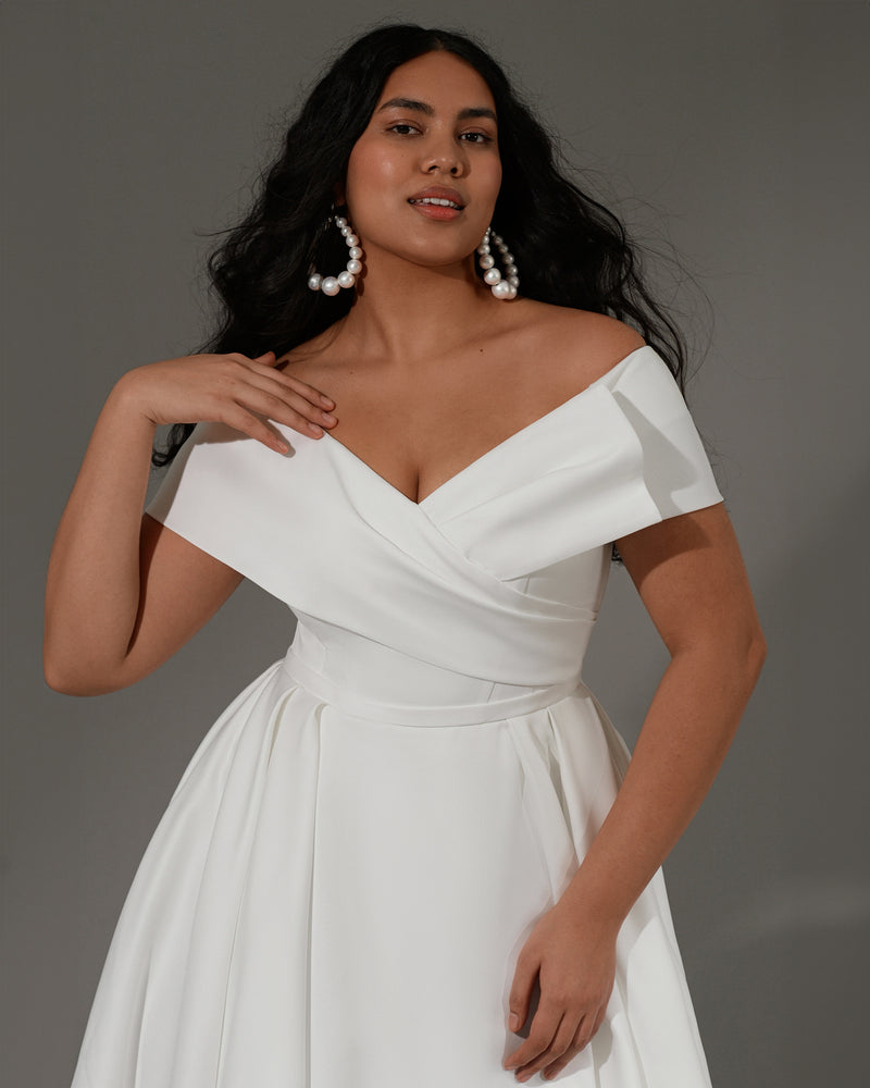 Off-the-shoulder A-Line Minimal Wedding Dress with Captivating Cross-Bodice Pleating