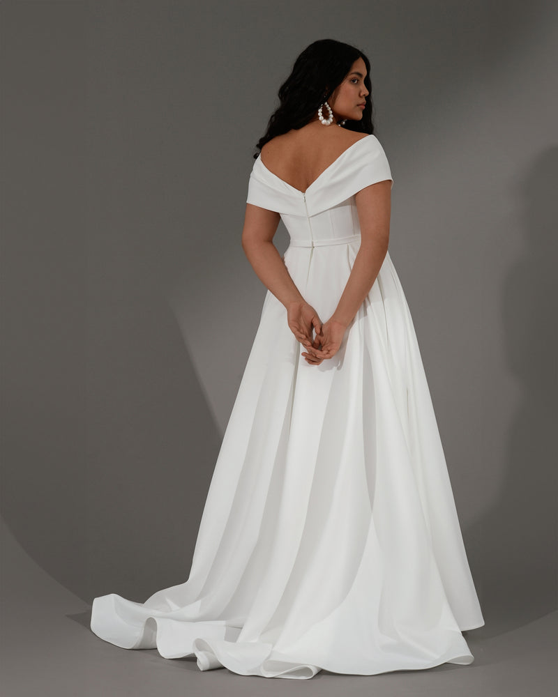 Off-the-shoulder A-Line Minimal Wedding Dress with Captivating Cross-Bodice Pleating